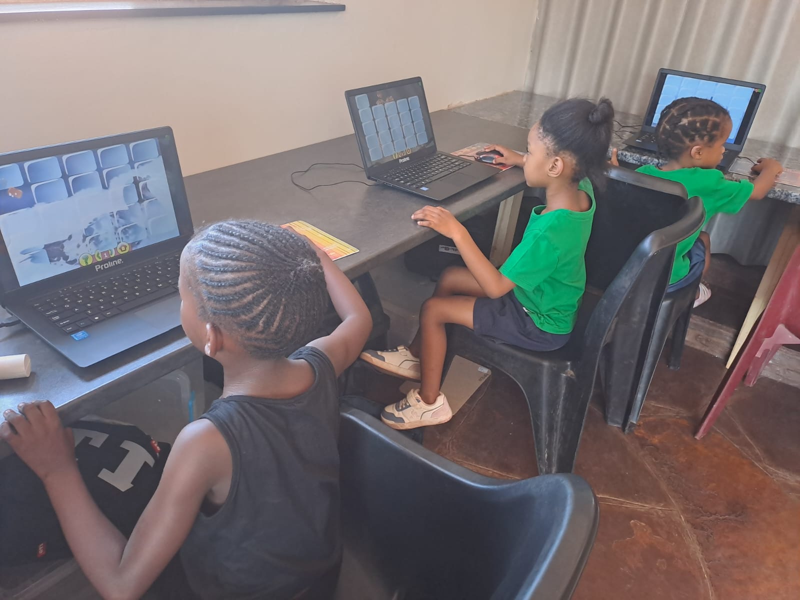 Students learning on laptops